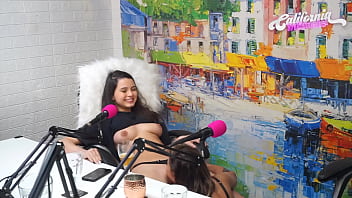 Flavia Oliver gives Natasha Steffens a sensual blowjob while recording the California Podcast