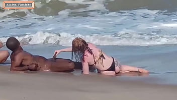 Two women have threesome with stranger on the beach